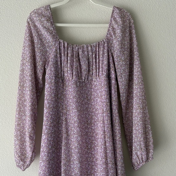 Long sleeve skater dress in purple with white and yellow floral design - Picture 3 of 7